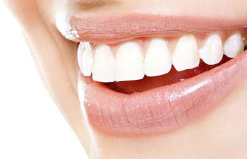 Patient of Family Dentist in Rocky Hill, CT showing healthy teeth and gums in her smile.