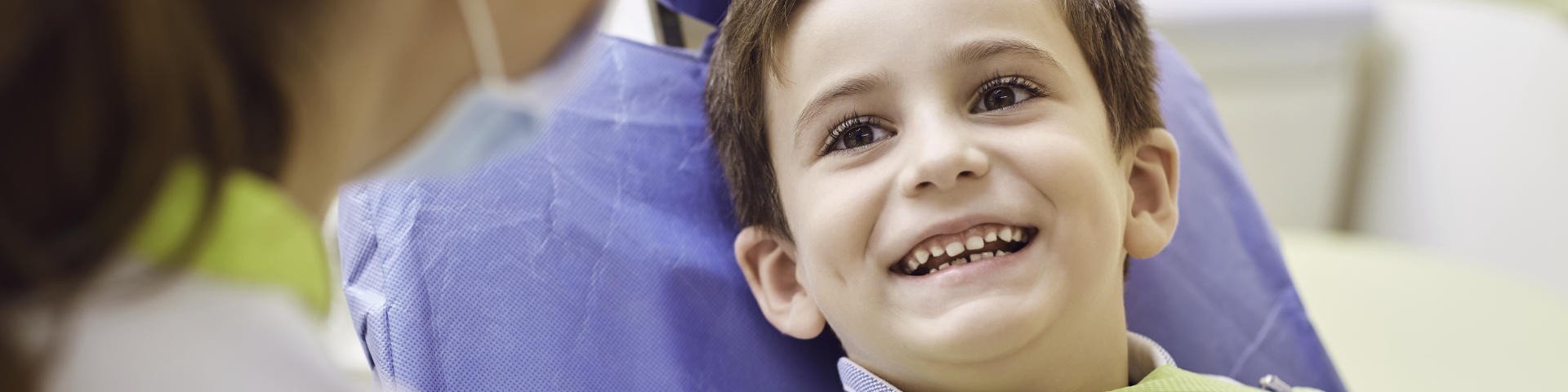 A joyful boy in a dental chair at Family Dentist in Rocky Hill, CT.