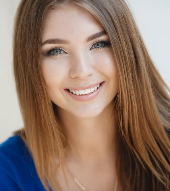 happy young woman with perfect smile