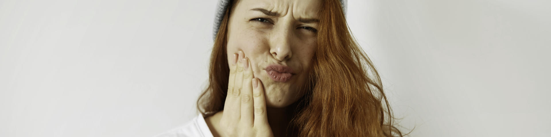 woman with dental pain